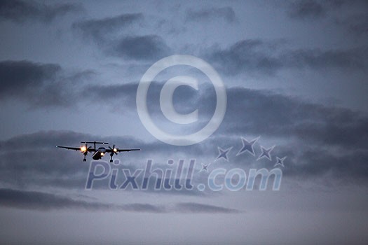 Passenger Airliner flying in the clouds