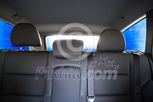 Car in a carwash - view from the interior of the vehicle