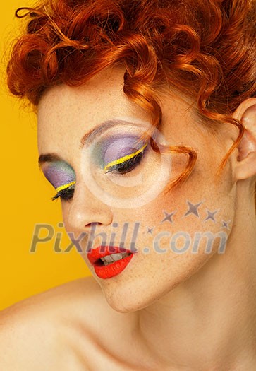 Red-haired. Beautiful girl with bright makeup. Ginger with freckles. Red-haired. Beautiful girl with bright makeup. Ginger with freckles.