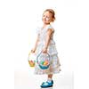 Little girl with baskets filled with Easter eggs