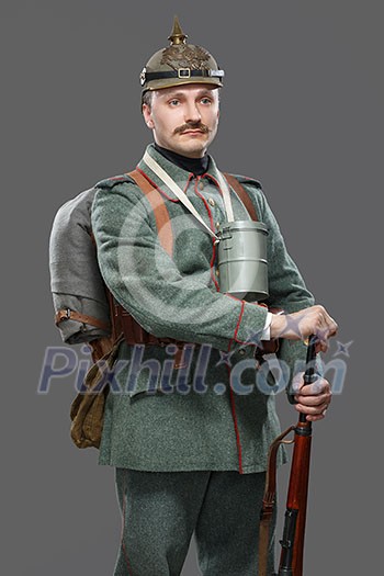 German infantryman during the first world war. Isolated on gray. German infantryman during the first world war. Isolated on gray.