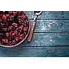 Berry pie on a wooden table. Copyspace for text on the right.