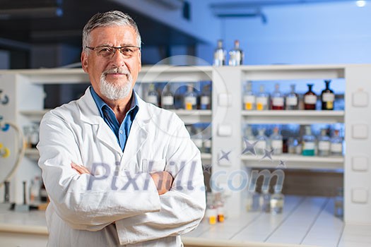 Senior chemistry professor/doctor in a lab (color toned image) Senior chemistry professor/doctor in a lab (color toned image)