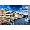 Europe travel background - street along canal and medieval houses. Bruges (Brugge), Belgium