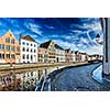 Europe travel background - street along canal and medieval houses. Bruges (Brugge), Belgium