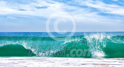 Big wave in ocean with blue sky, panoramic image
