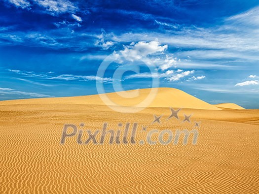 White sand dunes in desert on sunrise, Mui Ne, Vietnam. White sand dunes in desert on sunrise, Mui Ne, Vietnam.