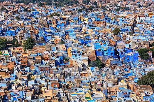 Aerial view of Jodhpur, also known as Blue City due to the vivid blue-painted Brahmin houses around Mehrangarh Fort. Jodphur, Rajasthan Aerial view of Jodhpur, also known as Blue City due to the vivid blue-painted Brahmin houses around Mehrangarh Fort. Jodphur, Rajasthan