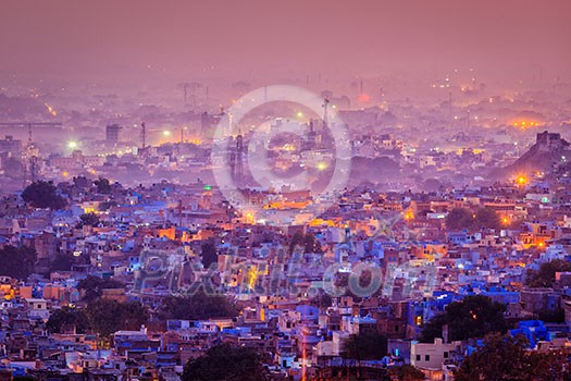 Aerial view of Jodhpur (aka Blue City due to the vivid blue-painted Brahmin houses around Mehrangarh Fort) in the evening twilight. Jodphur, Rajasthan