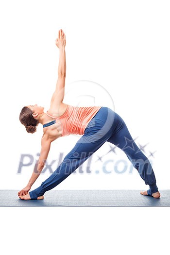 Young fit woman doing Ashtanga Vinyasa Yoga asana utthita trikonasana - extended triangle pose view from back ashtanga-vinyasa style Young fit woman doing Ashtanga Vinyasa Yoga asana utthita trikonasana - extended triangle pose view from back ashtanga-vinyasa style