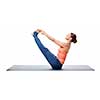 Beautiful sporty fit woman practices yoga asana Ubhaya padangusthasana - both big double toe pose isolated on white