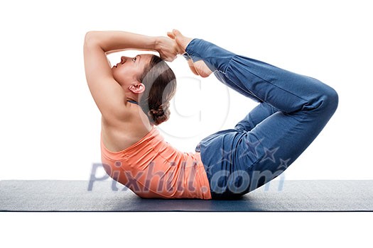 Sporty fit woman practices yoga asana Dhanurasana - bow pose isolated on white Sporty fit woman practices yoga asana Dhanurasana - bow pose isolated on white