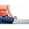 Close up of woman doing yoga asana Padmasana (Lotus pose) cross legged position for meditation with Chin Mudra - psychic gesture of consciousness. Isolated on white background with copyspace