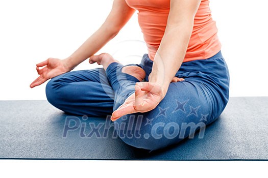 Close up of woman doing yoga asana Padmasana (Lotus pose) cross legged position for meditation with Chin Mudra (psychic gesture of consciousness). Isolated on white background Close up of woman doing yoga asana Padmasana (Lotus pose) cross legged position for meditation with Chin Mudra (psychic gesture of consciousness). Isolated on white background