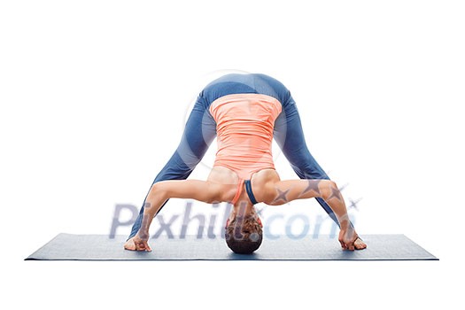 Beautiful sporty fit woman practices Ashtanga Vinyasa yoga asana Prasarita padottanasana D - wide legged forward bend D isolated on white background Beautiful sporty fit woman practices Ashtanga Vinyasa yoga asana Prasarita padottanasana D - wide legged forward bend D isolated on white background