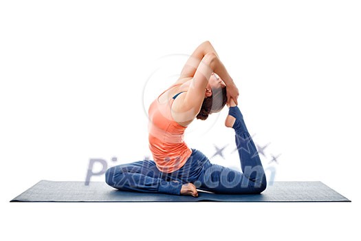 Sporty fit yogini woman doing yoga asana Eka pada kapotasana - one-legged pigeon pose isolated on white Sporty fit yogini woman doing yoga asana Eka pada kapotasana - one-legged pigeon pose isolated on white