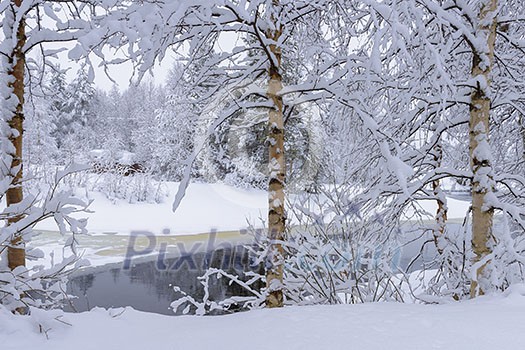Northern river scenery in february with snow and ice Northern river scenery in february with snow and ice