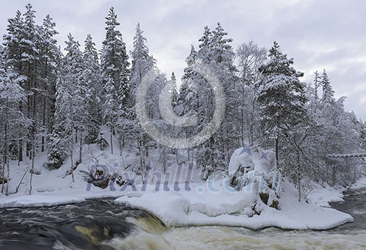 Northern river scenery in february with snow and ice Northern river scenery in february with snow and ice