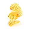Several potato chips isolated on white background