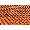 Closeup of red clay interlocking roofing tiles background