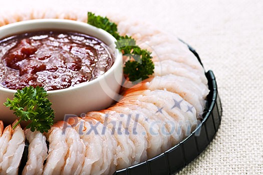 Shrimp ring appetizer platter with dipping sauce Shrimp ring appetizer platter with dipping sauce