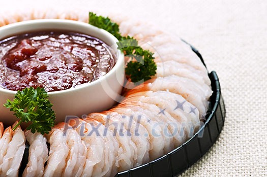 Shrimp ring appetizer platter with dipping sauce