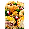 Assorted platter of sandwiches with meat and vegetables