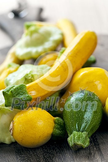 Assorted whole fresh organic mini zucchinis vegetables