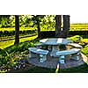 Benches and table near vineyard at winery