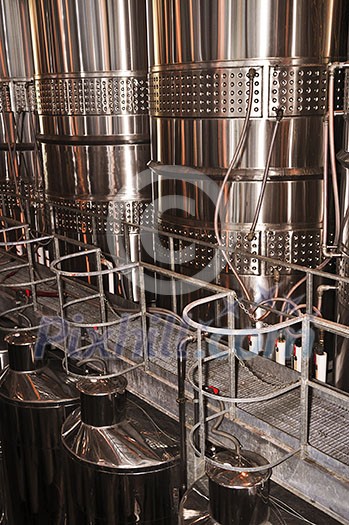 Wine making vats and equipment in tour of winery