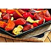 Vegetarian dish of roasted yams with cheese and peppers