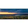 Fall forest trees and sunset viewed from Lookout trail in Algonquin Provincial Park, Canada.