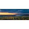 Fall forest trees and sunset viewed from Lookout trail in Algonquin Provincial Park, Canada.