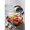 Home preserving mixed vegetables by pickling in glass canning jars