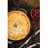 Traditional pork meat pie Tourtiere with apple and cranberry chutney from Quebec, Canada, top view