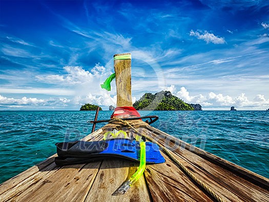 Snorkeling set on boat heading to tropical island in Thailand