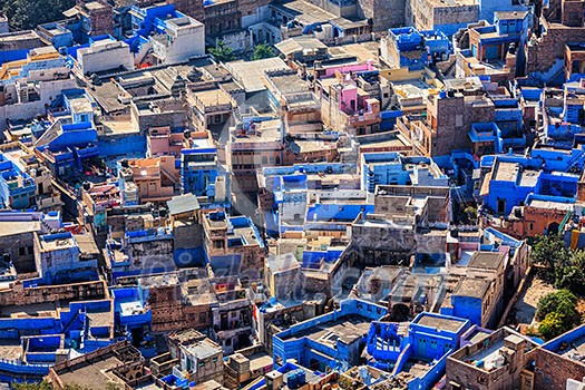 Aerial view of Jodhpur, also known as Blue City due to the vivid blue-painted Brahmin houses around Mehrangarh Fort. Jodphur, Rajasthan Aerial view of Jodhpur, also known as Blue City due to the vivid blue-painted Brahmin houses around Mehrangarh Fort. Jodphur, Rajasthan