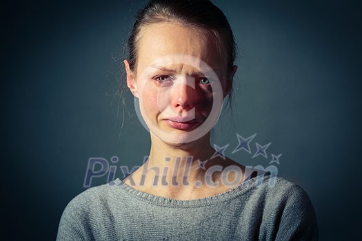 Young woman suffering from severe depression/anxiety/sadness Young woman suffering from severe depression/anxiety/sadness
