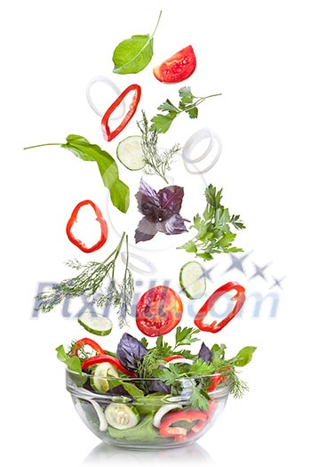Falling vegetables for salad isolated on white Falling vegetables for salad isolated on white