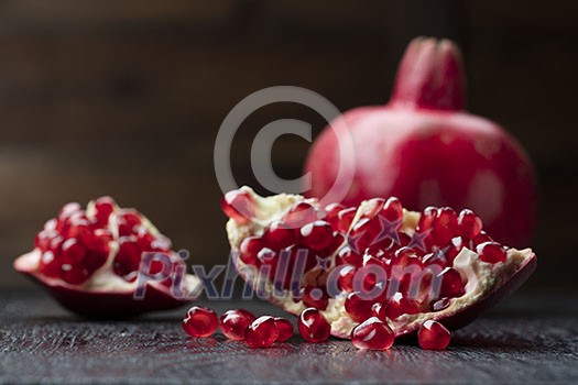 pomegranate on the black background