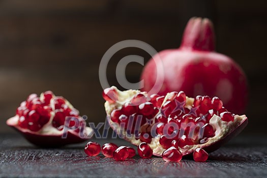 pomegranate on the black background pomegranate on the black background