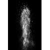 White powder explosion isolated on black background