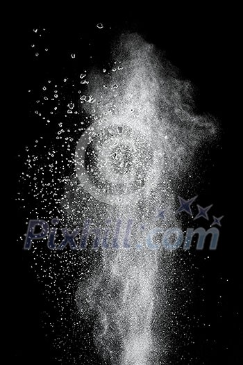 White powder explosion isolated on black background White powder explosion isolated on black background