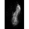 White powder explosion isolated on black background