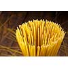 italian spaghetti on wooden background. Top view
