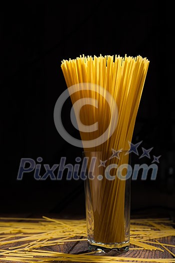italian spaghetti on black background italian spaghetti on black background