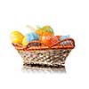 color easter eggs in basket isolated on white