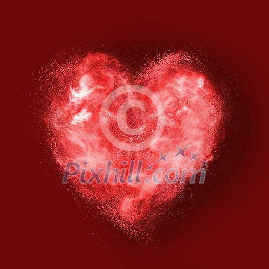 heart made of powder explosion on red background