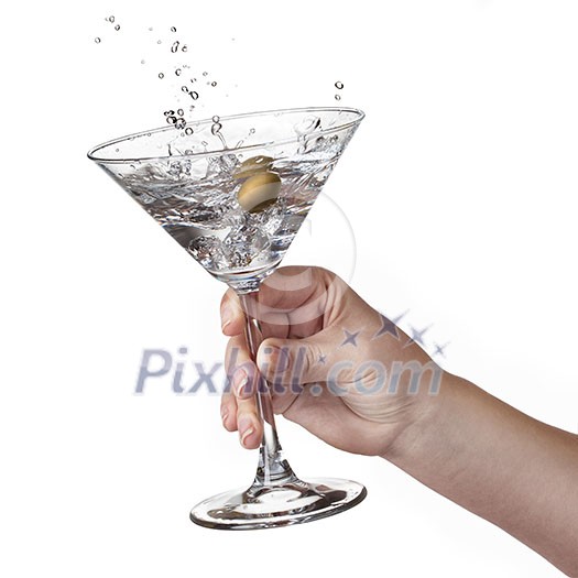 Martini with splash and olive in womans hand isolated on white Martini with splash and olive in womans hand isolated on white