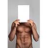 Muscular naked man holding white empty paper